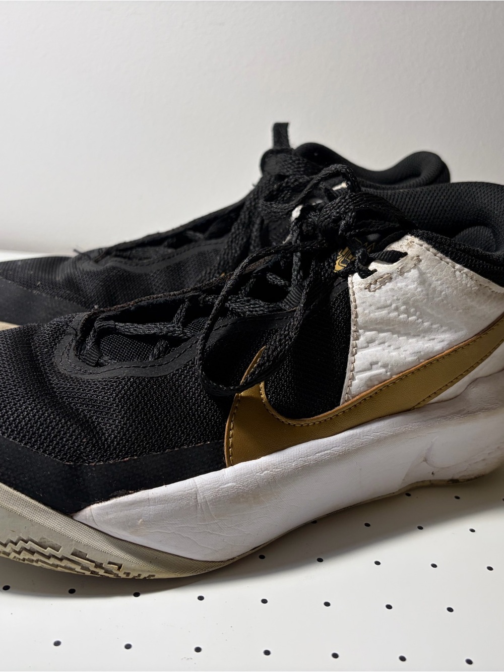 Nike Black and Gold Sneakers